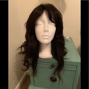 Human hair wig in natural black shade.